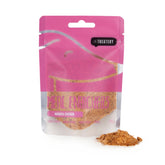 Pink package of Treatery Manuka Chicken with visible chicken pieces on a white background
